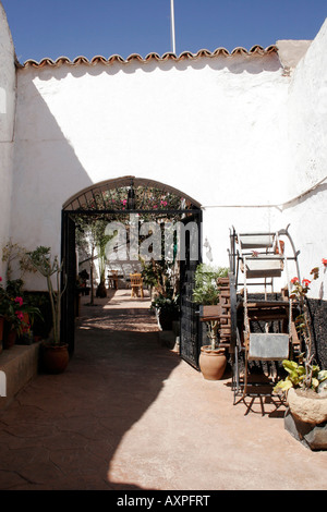 A CANARIAN COURTYARD IN THE VILLAGE OF BETANCURIA ON THE ISLAND OF FUERTEVENTURA. EUROPE. Stock Photo