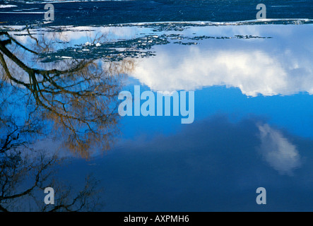 Icy water with reflections Stock Photo