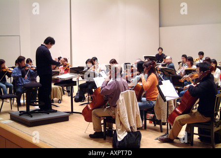 Conductor Shuntaro Sato and the Kyoto Philharmonic Chamber Orchestra in rehearsal Kyoto Japan November 2005 Stock Photo