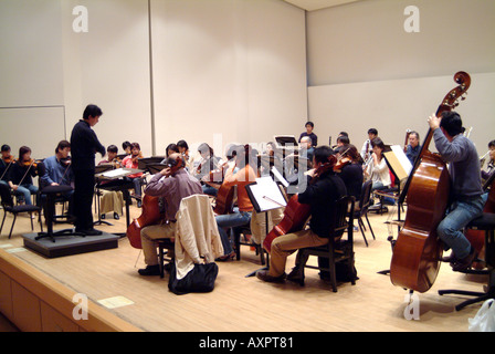 Conductor Shuntaro Sato and the Kyoto Philharmonic Chamber Orchestra in rehearsal Kyoto Japan November 2005 Stock Photo