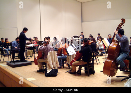 Conductor Shuntaro Sato and the Kyoto Philharmonic Chamber Orchestra in rehearsal Kyoto Japan November 2005 Stock Photo