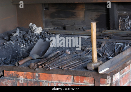 Blacksmith s forge and tools Stock Photo