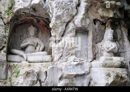 Stone carvings on the cliffs of the Peak Flying in from Afar at The Ling Yin Temple Hangzhou China Stock Photo