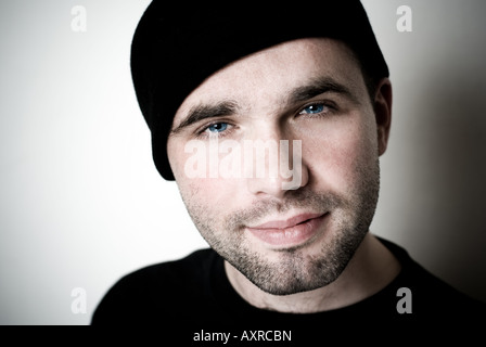 Portrait of young man - selective focus on the eyes. Stock Photo