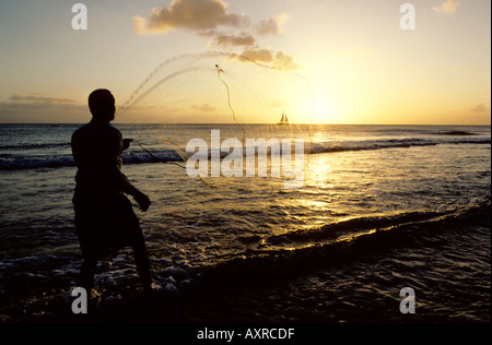 Fisherman throwing a castnet in the Muni lagoon near Winneba Ghana