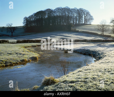 The River Churn on a cold frosty day in the cotswolds at North Cerney Stock Photo