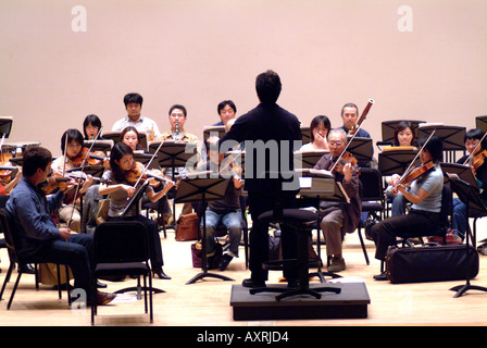 Conductor Shuntaro Sato and the Kyoto Philharmonic Chamber Orchestra in rehearsal Kyoto Japan November 2005 Stock Photo