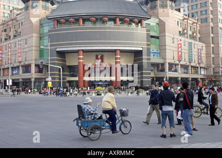 Chinese people in front of Sun Dong An Plaza mall in Wangfujing section of Beijing China Stock Photo