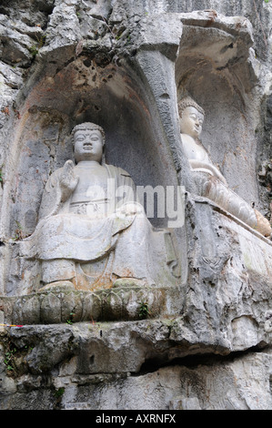 Stone carvings on the cliffs of the Peak Flying in from Afar at The Ling Yin Temple Hangzhou China Stock Photo