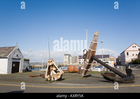 Maritime Museum building beside Victoria dock with old artefacts outside. Caernarfon Gwynedd North Wales UK Britain Stock Photo