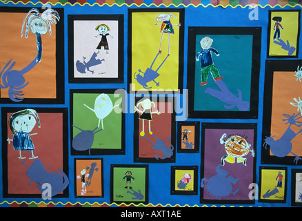 Art in a school done by art classes self portraits children's art class Stock Photo