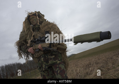 British Army Infantry soldiers demonstrate their newest L115A3 sniper rifle on firing ranges of the Support Weapon School UK Stock Photo