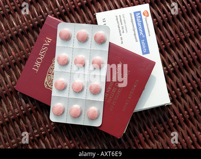 Anti Malaria tablets and passport Stock Photo