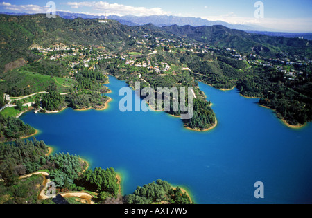 Aerial view of Hollywood sign and reservoir  in Hollywood Hills along base of Santa Monica Mountains in Southern California Stock Photo