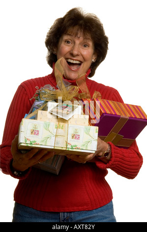 happy smiling excited middle age woman with gifts Stock Photo