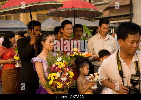 A photographer takes photos of a Cambodian wedding party Stock Photo