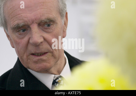 Exhibitor preparing his Dahlias for a flower show Stock Photo