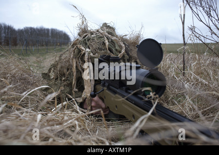 British Army Infantry soldiers demonstrate their newest L115A3 sniper rifle on firing ranges of the Support Weapon School UK Stock Photo