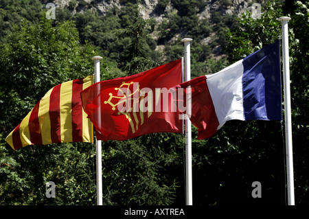 The Cathar flag is raised in between those of France and Catalonia Stock Photo