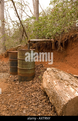 Old Moonshine Still Barrel at Hagood Grist Mill Pickens South Carolina USA Stock Photo