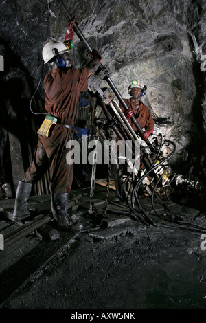 Underground exporation drilling using diamond drill, gold mine, Ghana Stock Photo