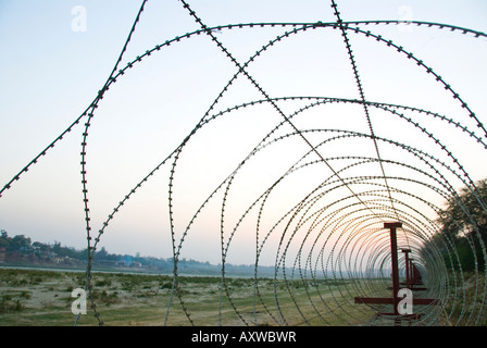 A security fence of razor wire Stock Photo