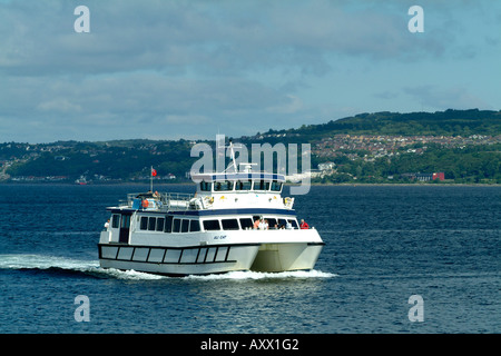 MV Ali Cat, a motor catamaran passenger ferry crossing the Firth of Clyde, Scotland. Stock Photo