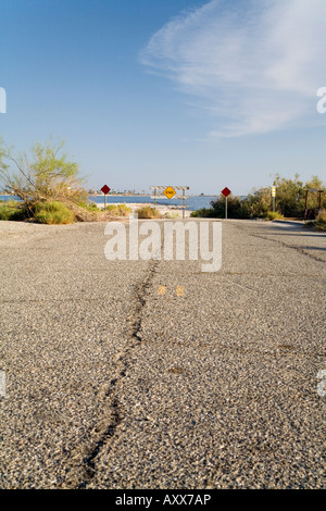 End of the road as a highway approaches the Salton Sea in California Stock Photo