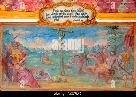religious painting The Brazen Serpent above entrance to Calvary Hill Church of the Holy Cross Bad Toelz Bavaria Germany Stock Photo