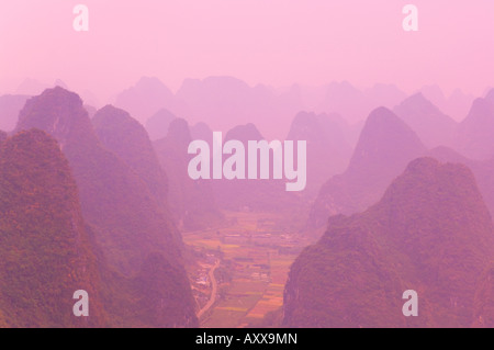 Karst landscape and haze, Yangshuo, Guangxi Province, China, Asia Stock Photo
