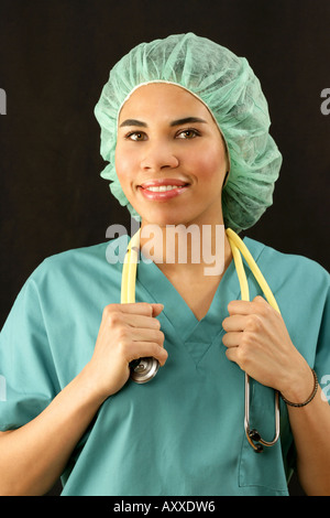 Medical nurse takes a break from a hard shift at the hospital. Stock Photo