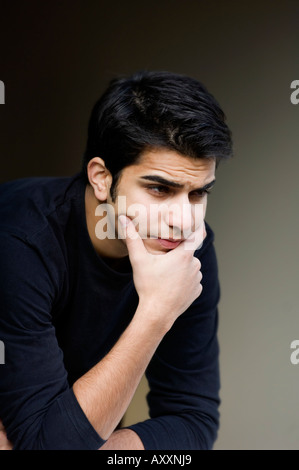 young man thinking Stock Photo