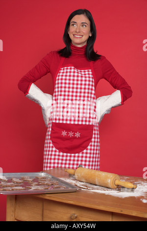 Woman baking Christmas cookies Stock Photo