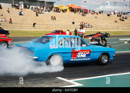 Drag racing Ford Capri performs a tyre warming burnout before running on the drag strip Stock Photo