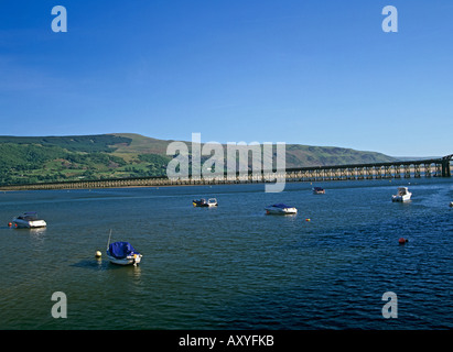 BARMOUTH GWYNEDD NORTH WALES June The tide is low under Barmouth Railway Bridge over the Afon Mawddach Stock Photo