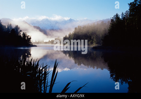 Lake Matheson at dawn, with reflection of the Southern Alps, Westland, South Island, New Zealand, Pacific Stock Photo