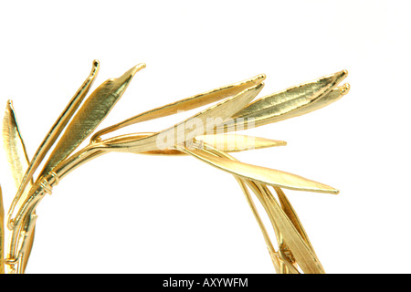 detail from gold winner olive tree wreath for olympic games winners isolated on white background Stock Photo