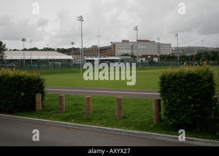 ASHLEIGH ROAD PLAYING FIELDS, SWANSEA, WITH THE WALES NATIONAL POOL AND SINGLETON HOSPITAL IN THE BACKGROUND, WEST GLAMORGAN, UK Stock Photo