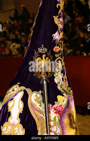 Nazareno wearing robes embroidered in gold and silk thread, Paso Blanco, Semana Santa, Lorca Stock Photo