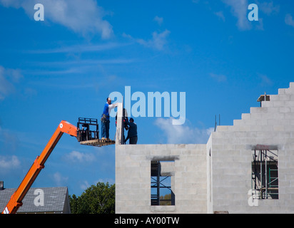 Worker on a cherry picker Stock Photo