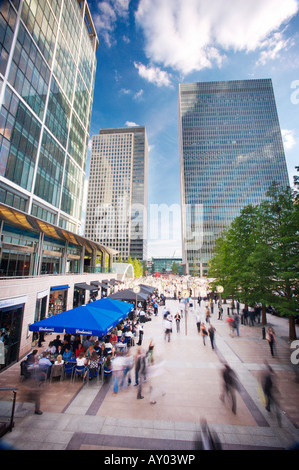 Business people walking past at Canary Wharf London England Stock Photo