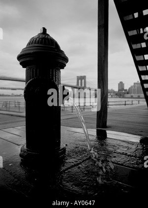 the brooklyn bridge from lower manhattan pier 17 new york city USA Stock Photo