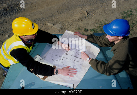 engineers consulting plans on site in leeds yorkshire uk Stock Photo