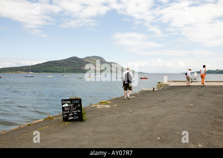 Holy Isle seen from Lamlash Pier on the Isle of Arran in Scotland Stock Photo