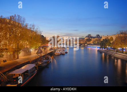 Blue hour on La Seine River and Pont des Arts, Paris, France Stock Photo