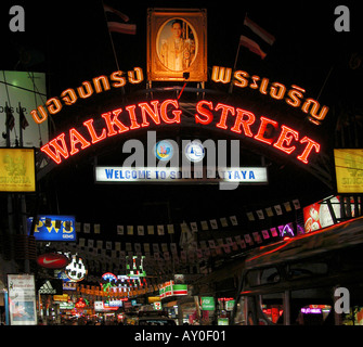 Walking Street, South Pattaya, Thailand with welcome signs and portrait of King Rama IX above at junction with Beach Road in 2004. Stock Photo