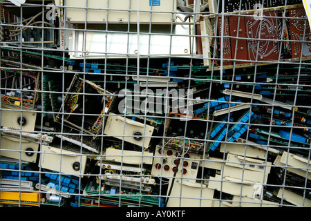 Electronic Waste in Skips Ready for Disposal Circuit boards from redundant equipment Stock Photo