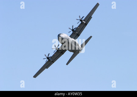 Hercules C130J in the air banking and turning Stock Photo