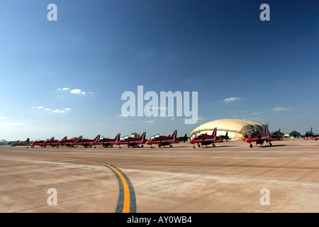 The famous Red Arrows aerobatic display team parked on the runway Stock Photo