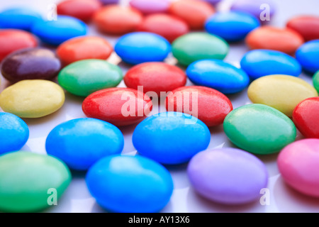 'Smarties' purple, red, green, yellow, sweets. Stock Photo